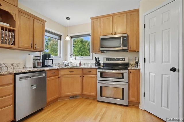 2303 Arciero Court, Howell, MI 48855