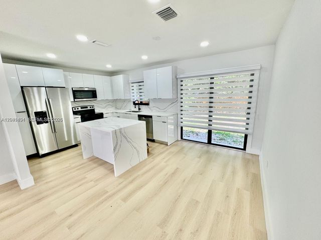 4131 NW 11th Pl, Miami, FL 33127