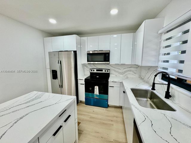4131 NW 11th Pl, Miami, FL 33127
