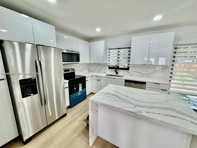 4131 NW 11th Pl, Miami, FL 33127