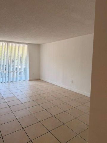 498 NW 165th St Road D204, Miami, FL 33169