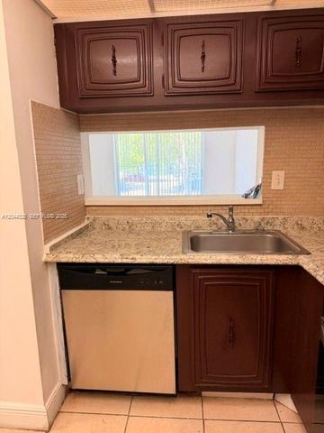498 NW 165th St Road D204, Miami, FL 33169