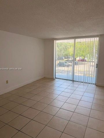 498 NW 165th St Road D204, Miami, FL 33169