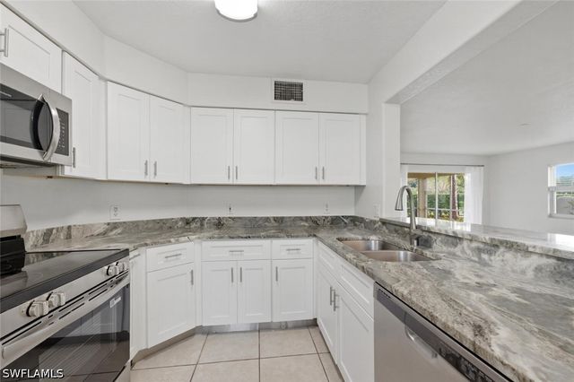9570 Crescent Garden DR A102, Naples, FL 34109