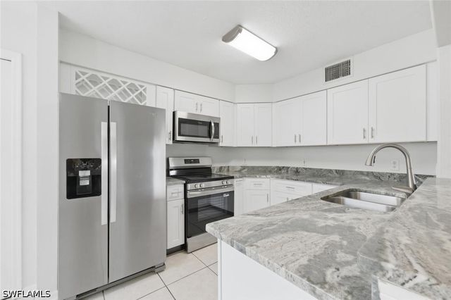 9570 Crescent Garden DR A102, Naples, FL 34109