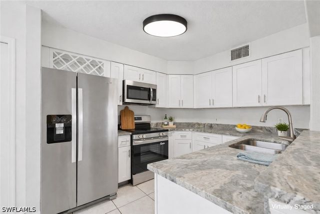 9570 Crescent Garden DR A102, Naples, FL 34109
