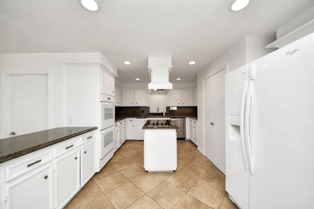 11906 Pebble Rock Drive, Houston, TX 77077