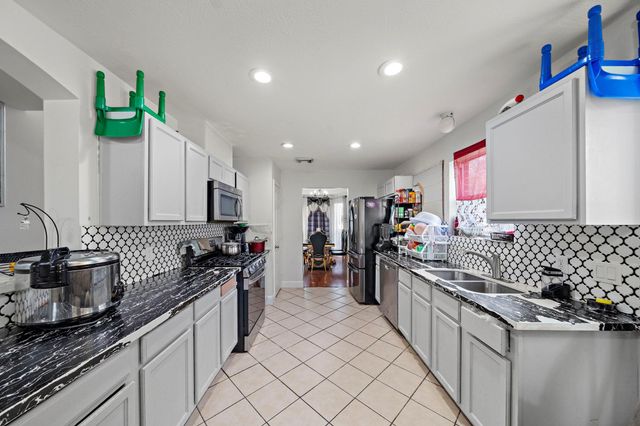 1122 N Magnolia Dale Drive, Fresno, TX 77545