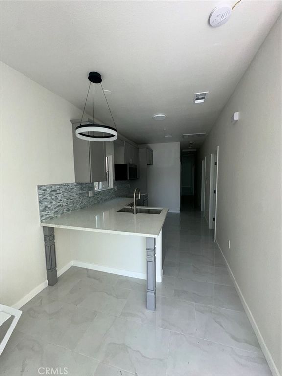 Image 3 of property listing at 2411 E 113th, Los Angeles, CA 90059