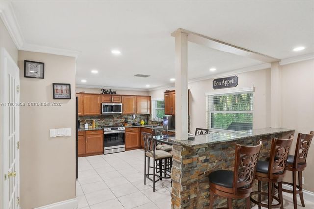 11573 NW 39th Pl, Coral Springs, FL 33065