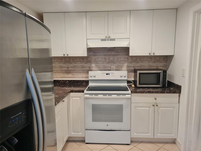300 Golden Isles Drive 104, Hallandale Beach, FL 33009