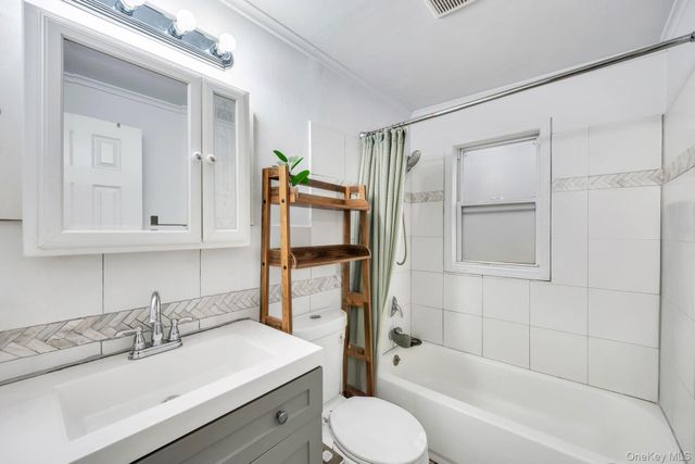 220 Woodycrest Drive, Holtsville, NY 11742