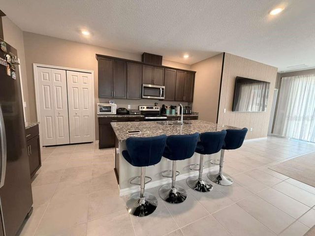 2293 TREASURE HILL STREET, Clermont, FL 34715