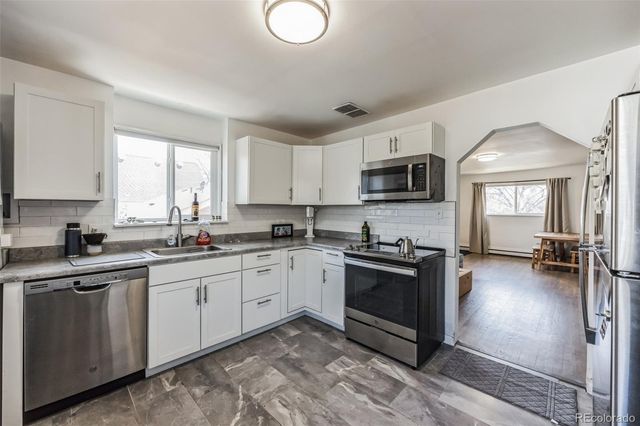 2551 W Caithness Place, Denver, CO 80211