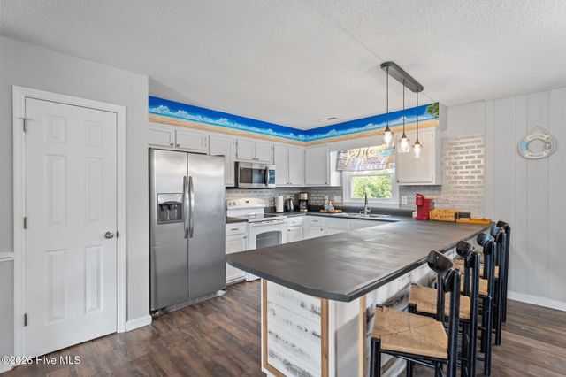 321 NE 59th Street, Oak Island, NC 28465