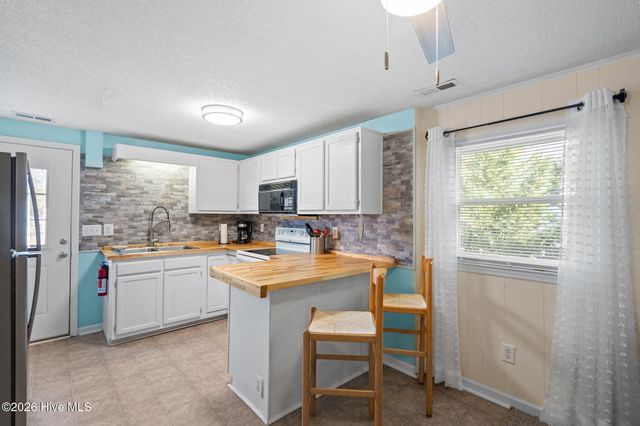 321 NE 59th Street, Oak Island, NC 28465