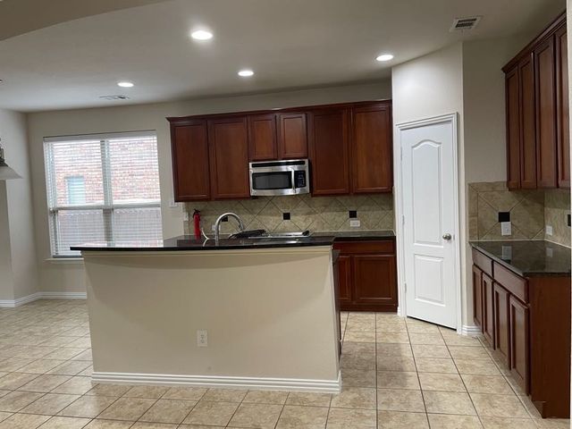 9845 Mcfarring Drive, Fort Worth, TX 76244