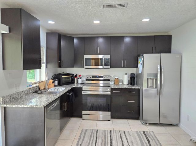 1549 SE Minorca Avenue, Port St Lucie, FL 34952