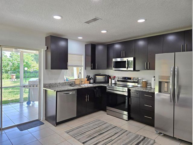 1549 SE Minorca Avenue, Port St Lucie, FL 34952