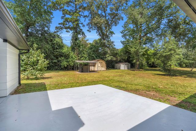 33102 Rollingwood Drive, Pinehurst, TX 77362