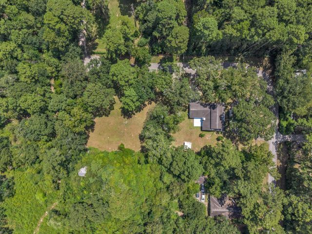 33102 Rollingwood Drive, Pinehurst, TX 77362