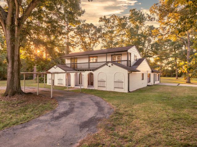 33102 Rollingwood Drive, Pinehurst, TX 77362
