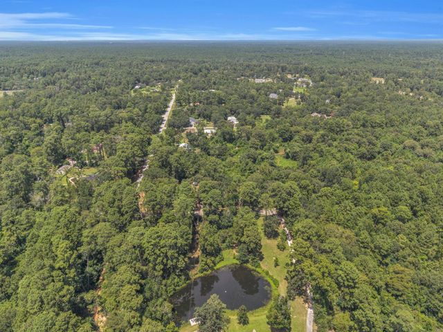 33102 Rollingwood Drive, Pinehurst, TX 77362