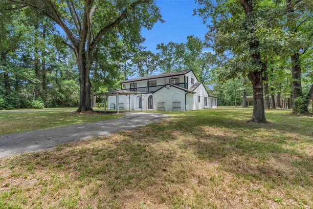 33102 Rollingwood Drive, Pinehurst, TX 77362