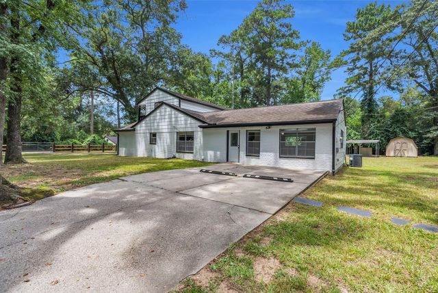 33102 Rollingwood Drive, Pinehurst, TX 77362