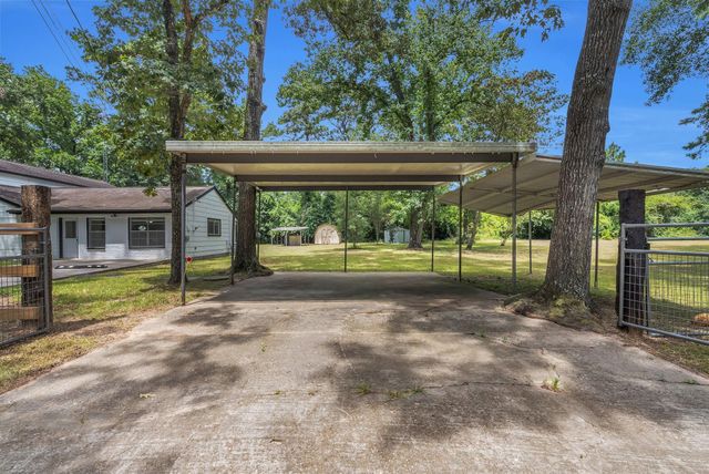 33102 Rollingwood Drive, Pinehurst, TX 77362