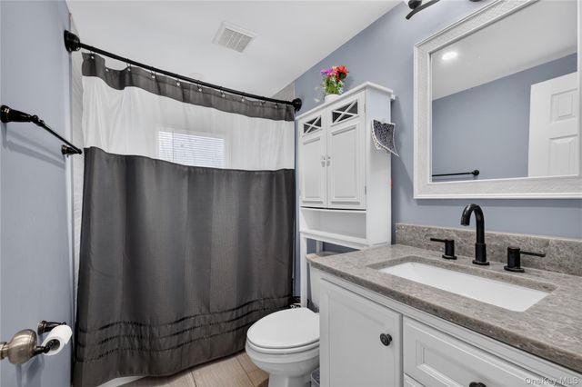 26 Saddler Lane, Levittown, NY 11756
