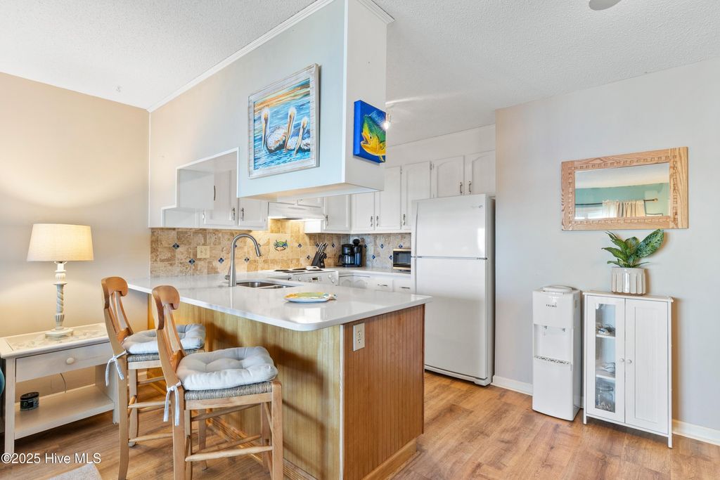 Image 12 of property listing at 1008 Canal Drive Apt 2a, Carolina Beach, NC 28428