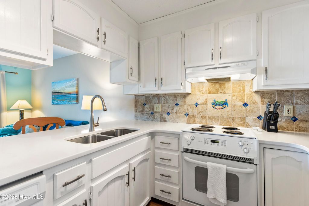 Image 16 of property listing at 1008 Canal Drive Apt 2a, Carolina Beach, NC 28428