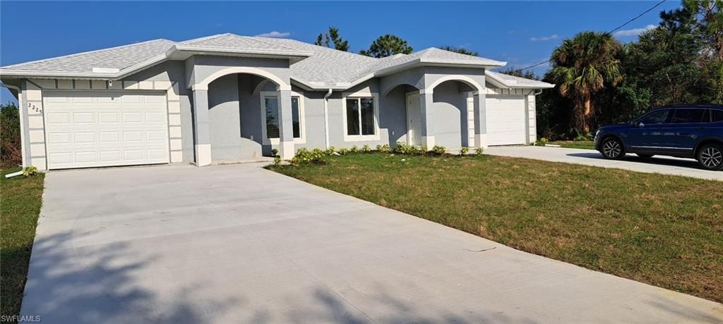 2225/2227 Snead DR, LEHIGH ACRES, FL 33973 — exterior