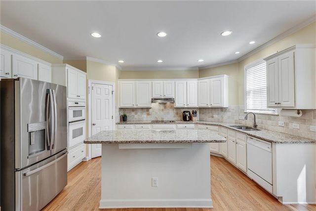 4214 Balmoral Glen Drive, Berkeley Lake, GA 30092