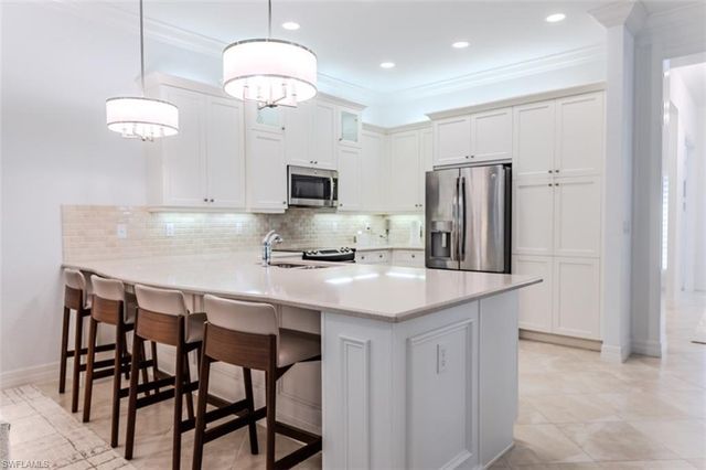 13670 MANDARIN CIR, Naples, FL 34109