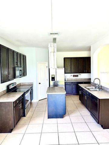 1944 THE OAKS BOULEVARD, Kissimmee, FL 34746