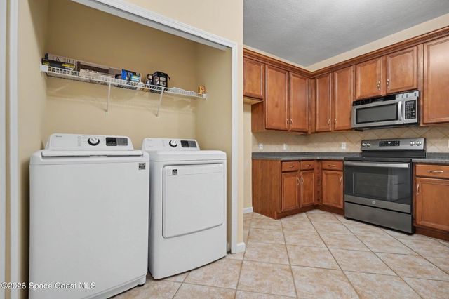 1921 Muirfield Way SE, Palm Bay, FL 32909