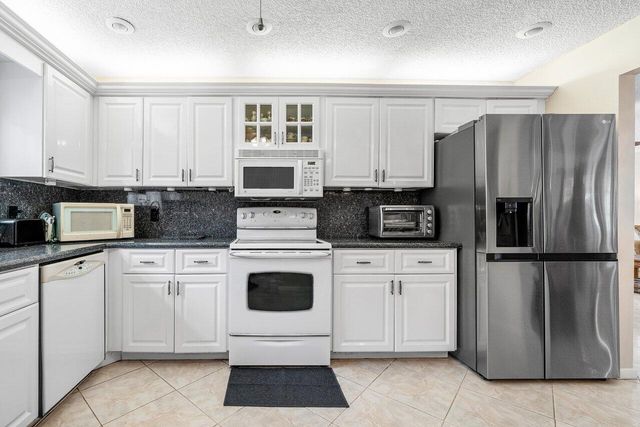 9100 Pine Springs Drive, Boca Raton, FL 33428