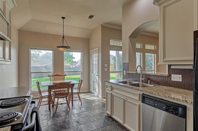 7090 Gentle Breeze Drive, Willis, TX 77318