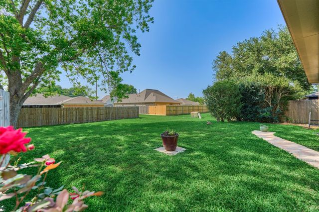 7090 Gentle Breeze Drive, Willis, TX 77318