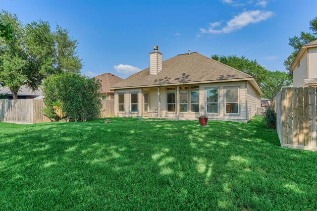 7090 Gentle Breeze Drive, Willis, TX 77318