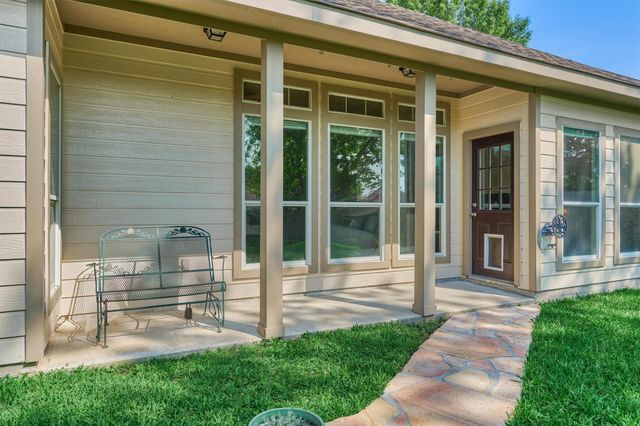 7090 Gentle Breeze Drive, Willis, TX 77318