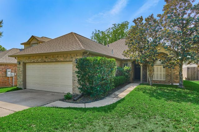 7090 Gentle Breeze Drive, Willis, TX 77318