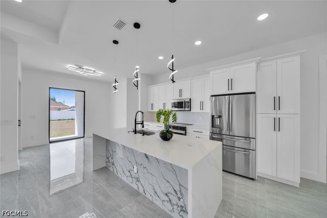 1226 NE Juanita PL, Cape Coral, FL 33909