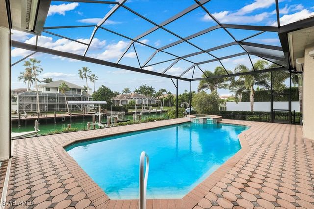 1589 CAXAMBAS CT, Marco Island, FL 34145