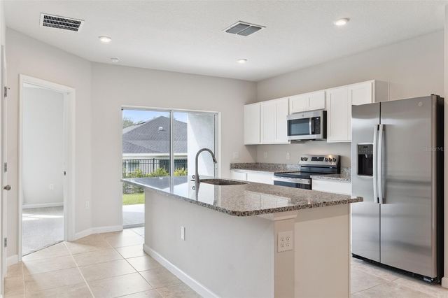 1206 PORT BLUE WAY, Lady Lake, FL 32159