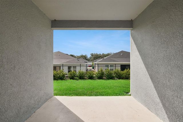 1206 PORT BLUE WAY, Lady Lake, FL 32159