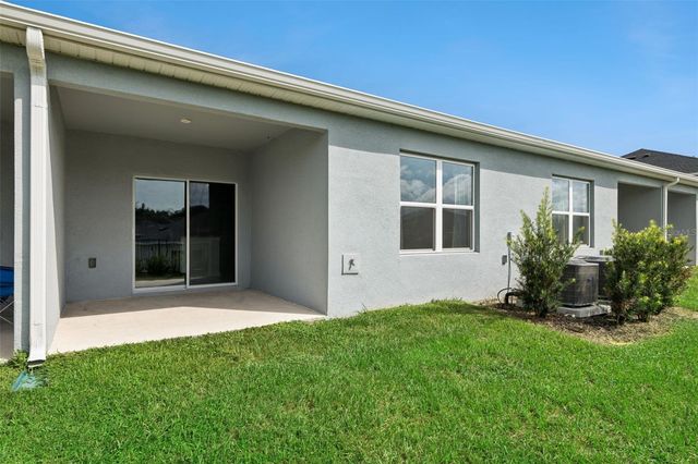 1206 PORT BLUE WAY, Lady Lake, FL 32159
