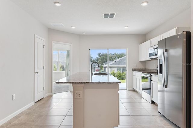 1206 PORT BLUE WAY, Lady Lake, FL 32159